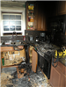 burnt kitchen cabinets and stove