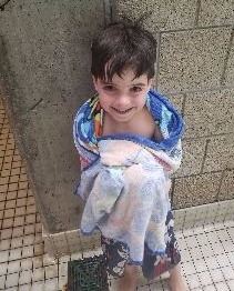This is an image of a child after swim lessons.