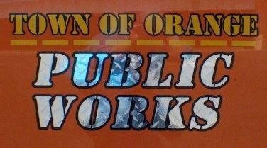 Image of Public Works and logo on truck doors
