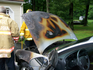 damaged hood of car