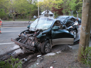 damaged front of a teal car