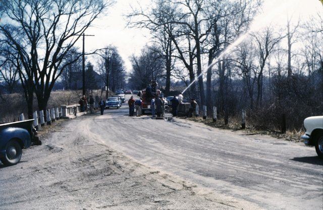 Fire Truck and Fire Hose Shooting Water