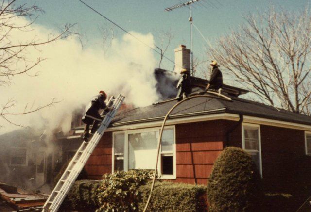 Red House With Smoke 