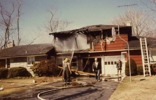 Red House With Smoke 