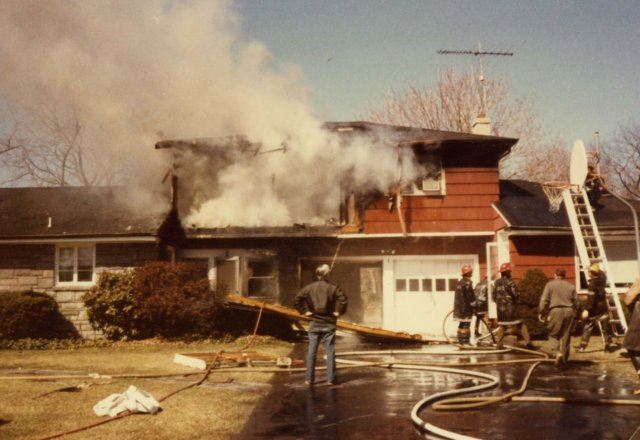 Red House With Smoke